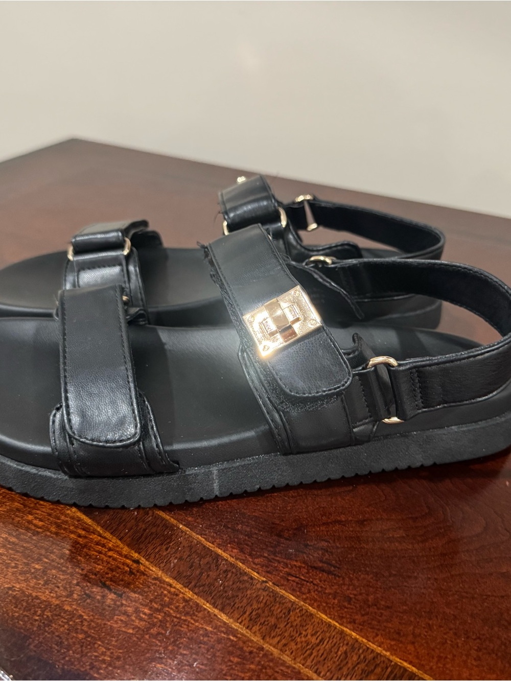 Fitory Black Leather Women’s Strap Sandals with Gold Hardware